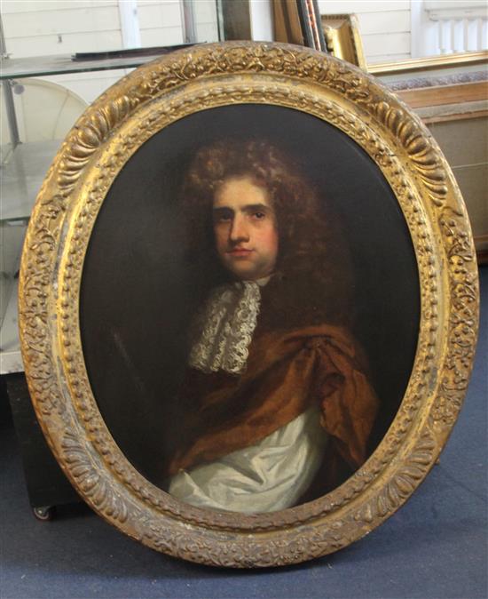 Early 18th century English School Portrait of a gentleman wearing a brown cloak and lace ruff 29.5 x 24.5in.